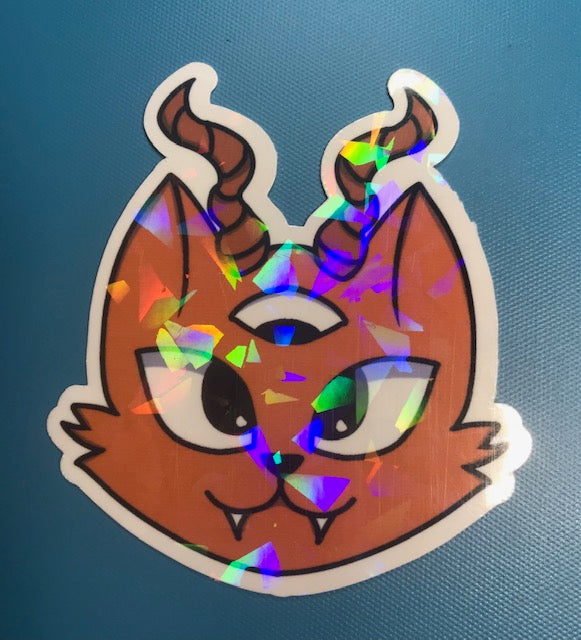 regular or holographic- Orange 3rd eye evil cat
