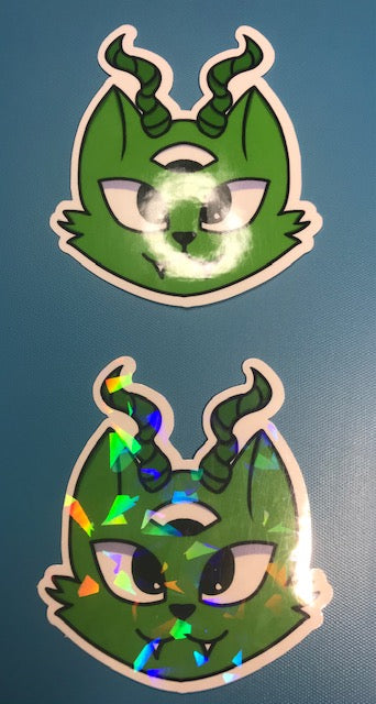 regular or holographic- Green 3rd eye evil cat