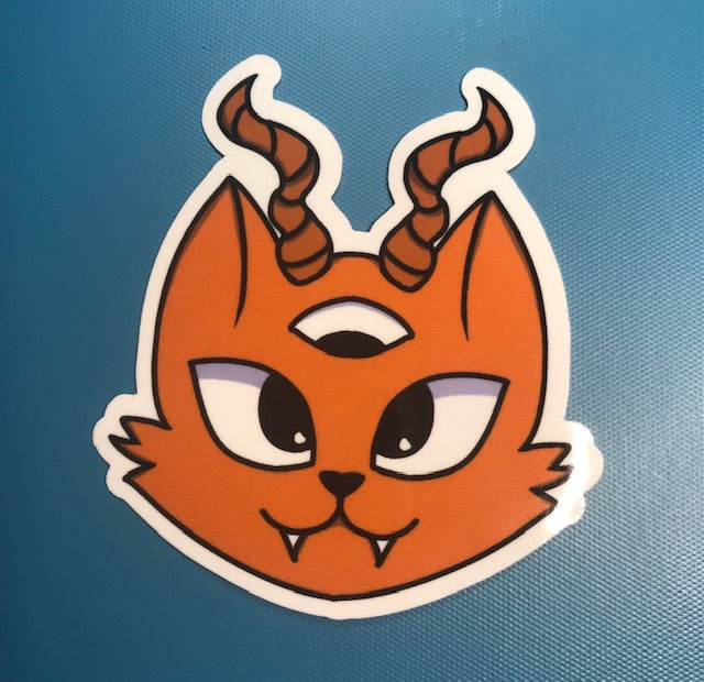 regular or holographic- Orange 3rd eye evil cat