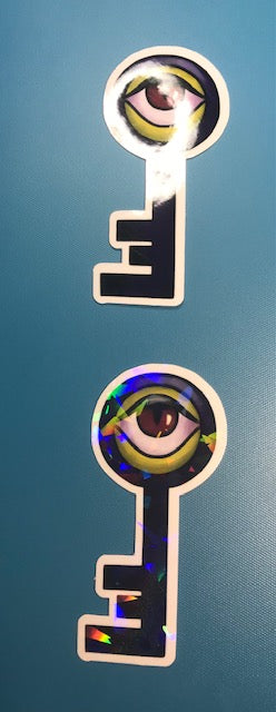 regular or holographic- Evil eye key
